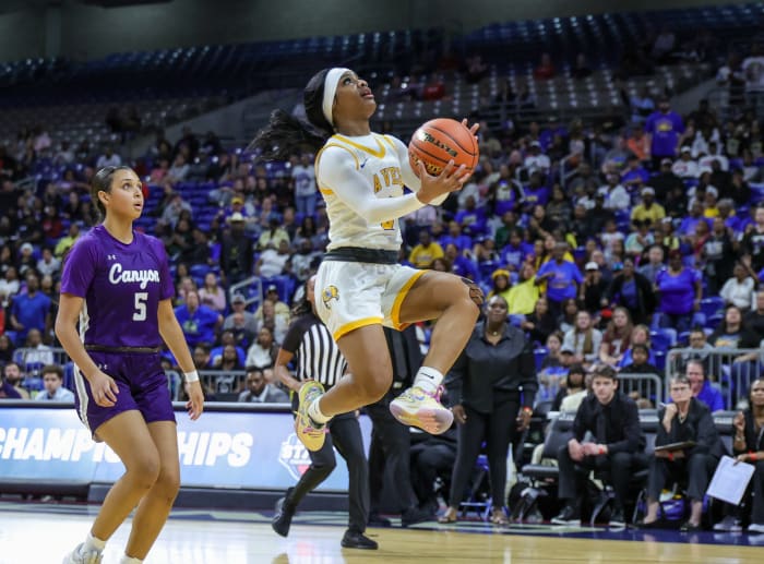Kiyleyah Parr, the 4A tournament MVP, scores two of her 15 points of La Vega's state title win over Canyon on Saturday.